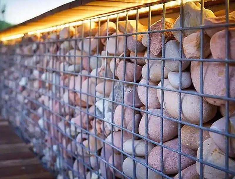 Security gabions are robust stone-filled cages for perimeter protection. 